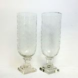 A pair of decorative cut glass storm lanterns, weighted  stepped square base, 35cm / 14"