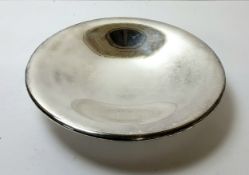 A stylish WMF bowl raised on three bun feet