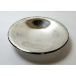 A stylish WMF bowl raised on three bun feet