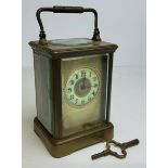 A 19th century French Corniche carriage clock, the backplate stamped with S  F , cream enamel