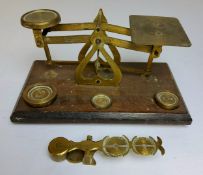 A set of 19th century HARRISON sovereign balance scales stamped with crown, Birmingham; a set of