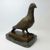 Pigeon Racing Interest - a prize winning pigeon, mounted on a stepped bronze and marble base 24cm