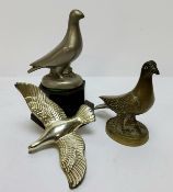 A heavy bronze homing racing pigeon car mascot / desk weight; Art Deco metal racing pigeon raised on