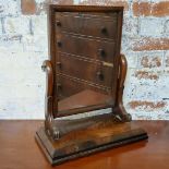 A 19th century flamed mahogany dressing table mirror c.1860, bevelled and foxed looking glass 55cm