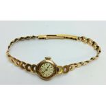 A 9ct gold lady's AVIA wristwatch, 17 jewel movement, integral 9ct gold bracelet hallmarked, J A