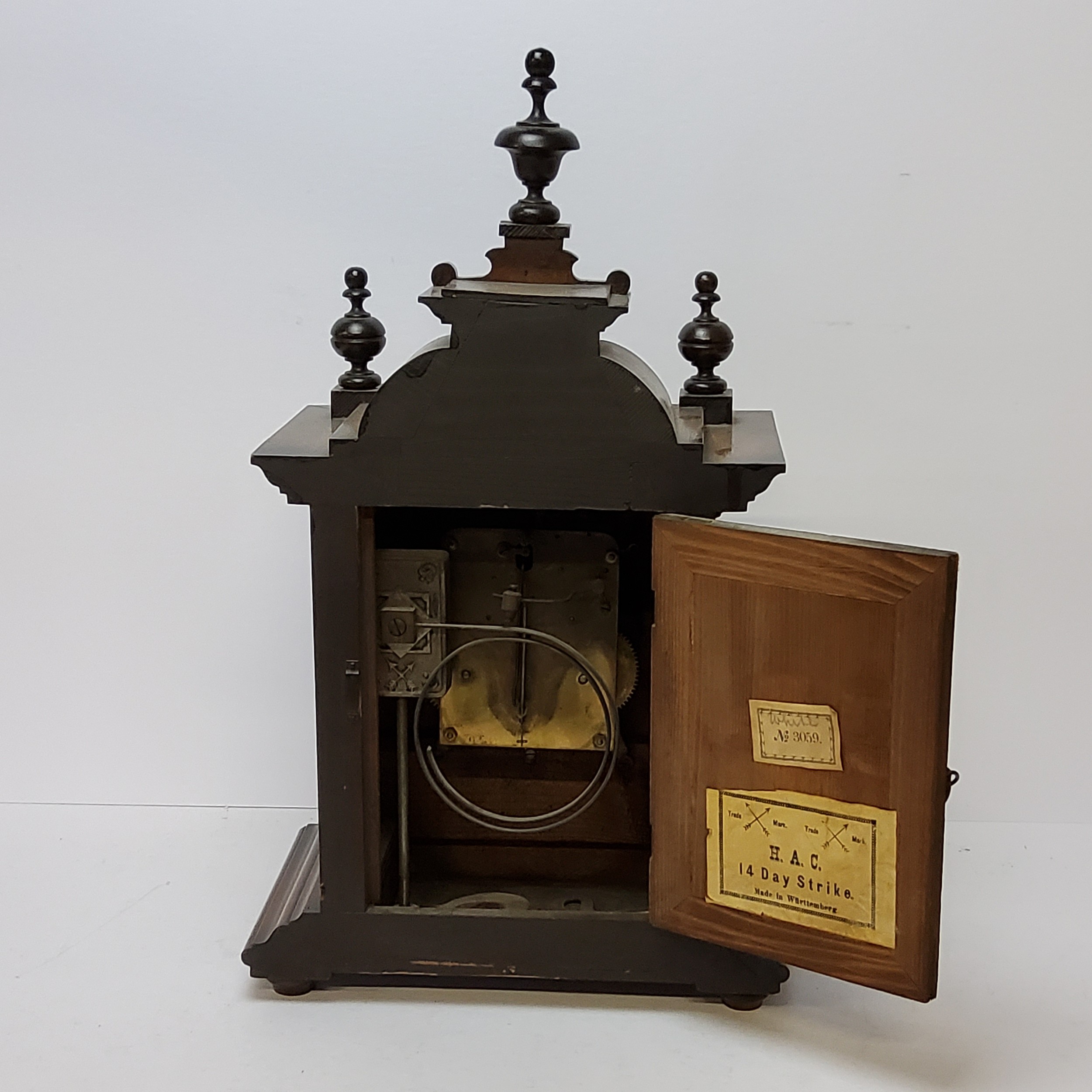 A walnut cased H.A.C. 14 day strike mantel clock, striking on a coiled gong. bevelled glass - Image 3 of 6