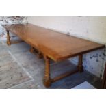 An extremely large country house 'antique' fruitwood extending dining table, 12ft 8in long (when