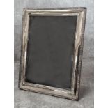 A modern sterling silver photo frame, Sheffield, 21cm High x 16.5cm (inside measurements = 17cm x