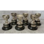 Golfing Interest - a set of six early golf trophies, all presented to Reg Horne, all with silver