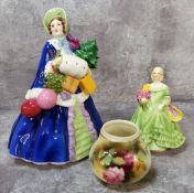 A Royal Doulton figure 'Noel' modelled by Sybil V Williams & Jasmine S Bray, Puce marks, signed