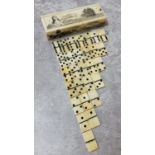 Small rectangular Scrimshaw box containing twenty eight miniature Whale Bone dominoes, decorated