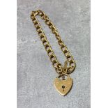 A 9ct gold charm bracelet, heart shaped padlock clasp, LC, London 1972 9.25g