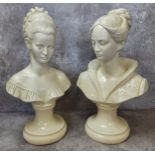 A pair of museum type Parian busts of elegant ladies in fanciful dress