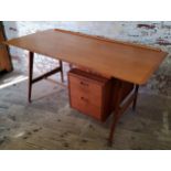 Mid 20th Century Design - A 1960s teak Danebridge desk, label inside the drawer read Danebridge