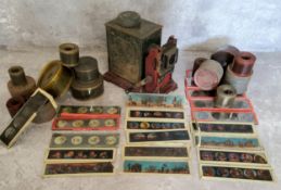 Vintage Juvenalia - an early 20th century child's slide projector with a collection of various