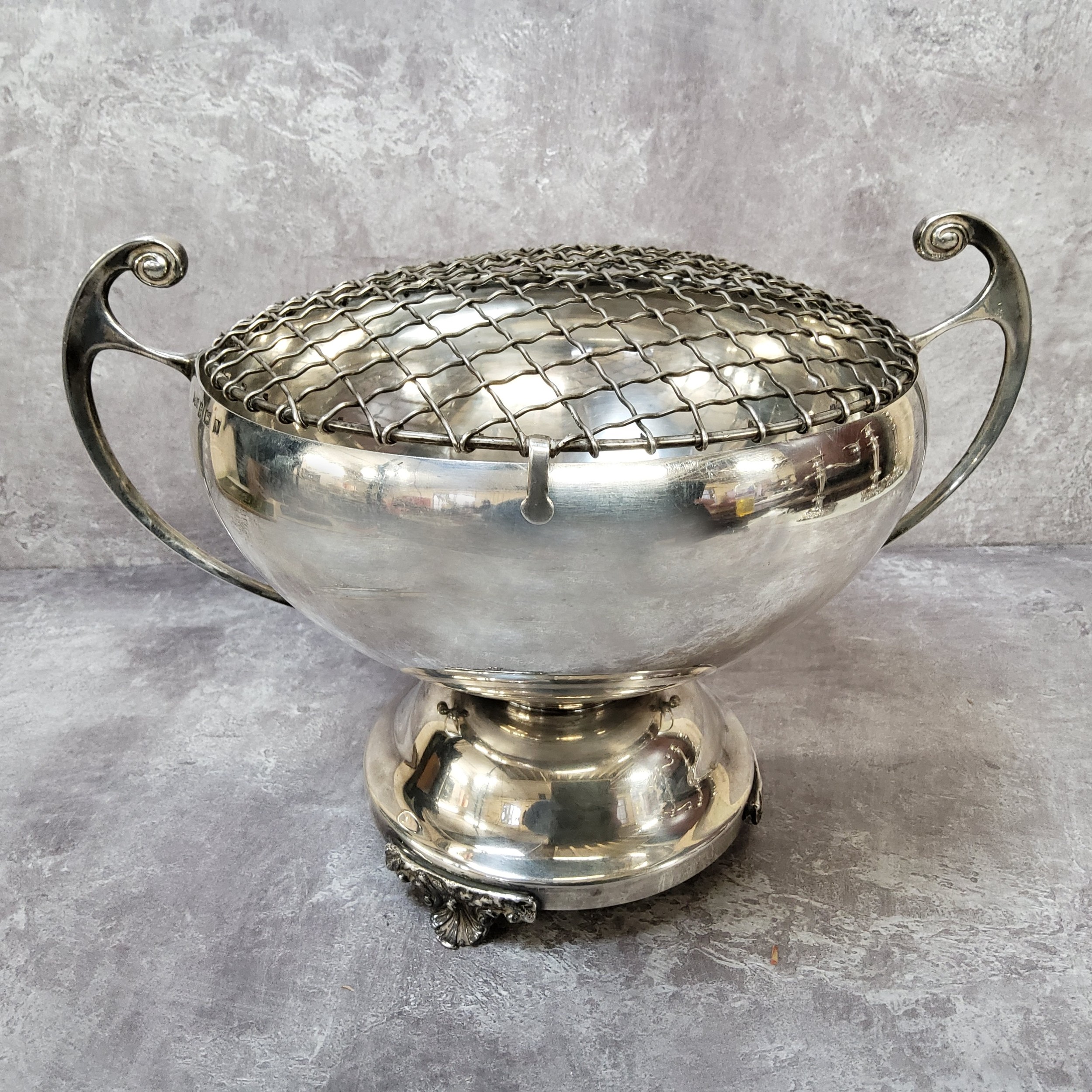 A silver two handled circular rose bowl, scroll handles, spreading circular foot, raised on three - Image 3 of 3