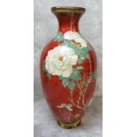 A large Japanese Meiji period cloisonne baluster vase, bold red ground decorated with blossoming