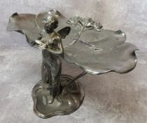 A silver plated WMF Art Nouveau visiting card tray, in the form of a fairy holding a bird with two