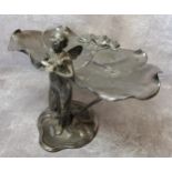 A silver plated WMF Art Nouveau visiting card tray, in the form of a fairy holding a bird with two