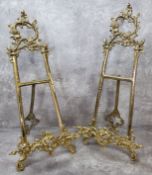 A pair of substantial ornate gilt metal table easels / stands 52cm high