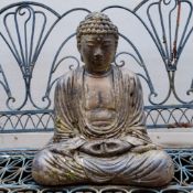 Garden Statutory - a reconstituted stone Bhudda, sitting in quiet meditation