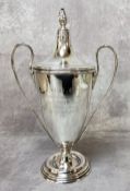 A George V silver twin handled golf trophy, ' G.G.C President's Cup 1923 won by R. Howlett ',