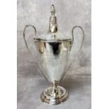 A George V silver twin handled golf trophy, ' G.G.C President's Cup 1923 won by R. Howlett ',