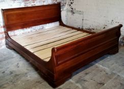 A Willis & Gambier mahogany super king size sleigh bed