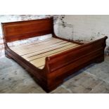 A Willis & Gambier mahogany super king size sleigh bed