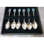 A set of six abalone shell inset teaspoons, cased