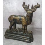 A 19th century iron door stop in the form of a stag, gilt patina c.1880