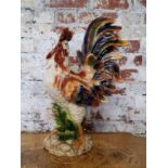 An impressive majolica pottery cockerel, indistinct markings in relief to base, standing 60cm