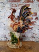 An impressive majolica pottery cockerel, indistinct markings in relief to base, standing 60cm