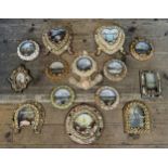 A very good collection of Fourteen Victorian shell-work souvenir porthole pictures, late 19th/