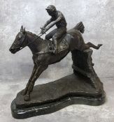 Horse Racing Interest - A well executed bronze horse and jockey clearing a fence, veined belge