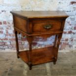 An 18th century style English oak canted hall table, probably by Titchmarsh & Goodwin, one long cock