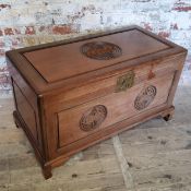 Oriental Furniture - a Chinese blanket chest, Ming style, long life and prosperity motif carved