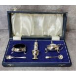 Please note LOT WITHDRAWN  - A silver condiment set by Elkington & Co. Ltd in fitted associated