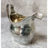A George III silver creamer, chased and engraved with foliage and scrolls, monogrammed H, Samuel &