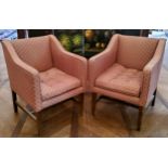 A pair of Regency style bedroom tub chairs, upholstered in tones of pink and gold 80cm high x 63cm