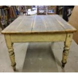 A Victorian pine kitchen table, heavily distressed paint, with a bespoke stainless steel cover for