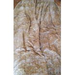 A pair of heavy embroidered silk pencil pleat curtains in tones of gold & pink on a gold ground,