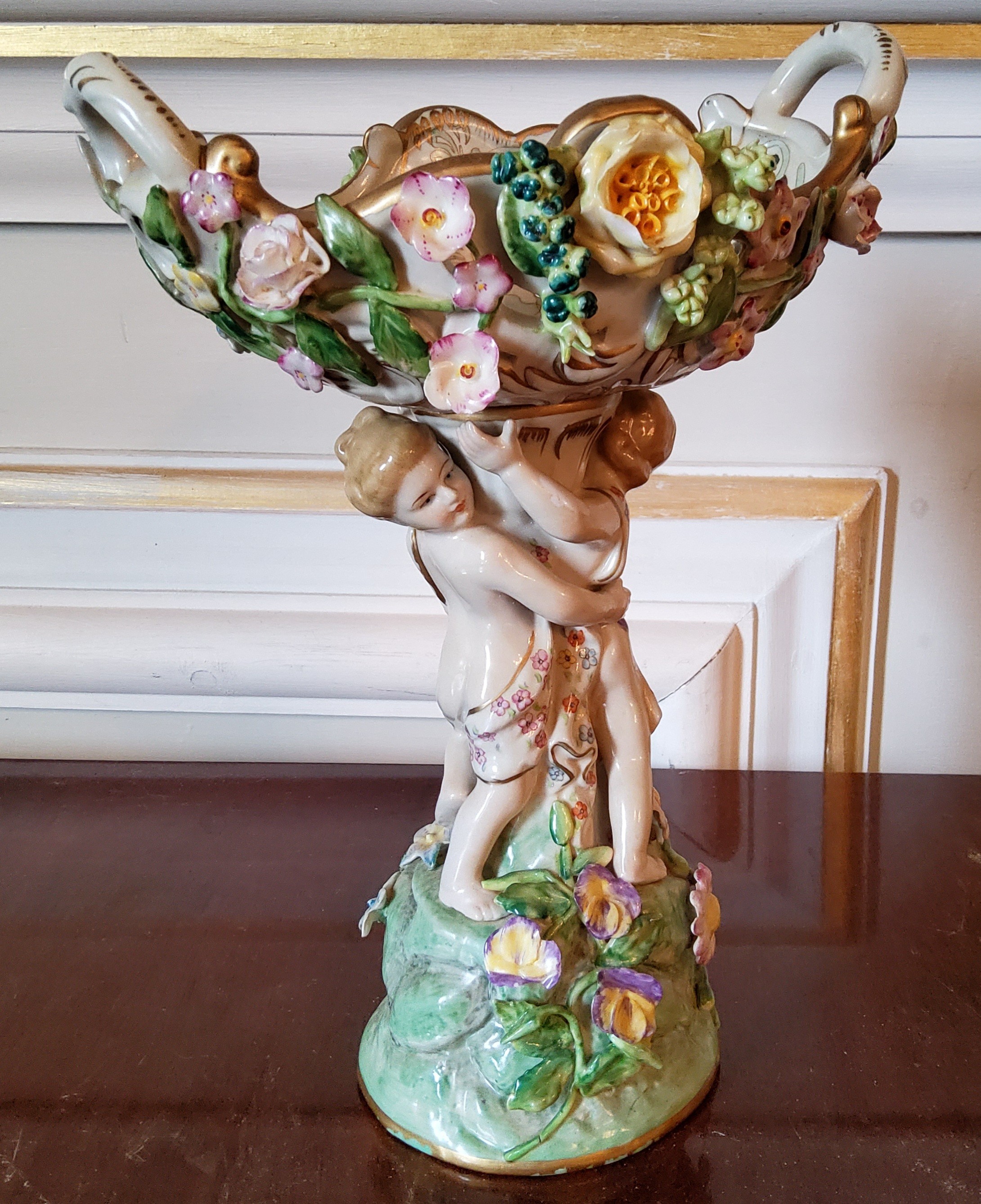 A Meissen centre piece with entwined putti supporting a central pierced bowl with applied flowers, - Image 6 of 6