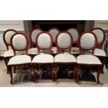 A set of nine Napoleon III design mahogany medallion back conference / parlour chairs