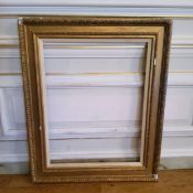 A Large decorative gilt frame, outside dimensions 100 cm wide x 120cm high. (inside measurements