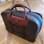 A genuine Mulberry suitcase on casters 55cm wide x 43cm high, tartan interior