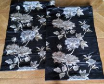 A pair of Roman blinds, machine embroidered roses in tones of cream, grey & gold on black silk,
