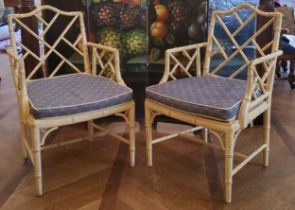 A good pair of 'George III' Chinese Chippendale Revival faux bamboo elbow chairs, washed in cream