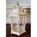 An 'Oriental' hanging birdcage in the form of a lantern 42cms high