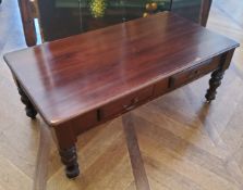 A large reproduction "Victorian" style coffee table, turned legs, short drawers to frieze, 130cm